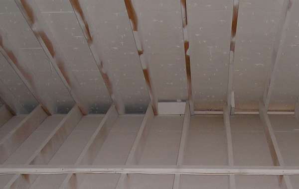An attic with 'insulating paint' which doesn't insulate
